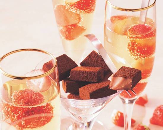 Order Nama Chocolate "Strawberry Champagne" food online from Royce' Chocolate store, Irvine on bringmethat.com