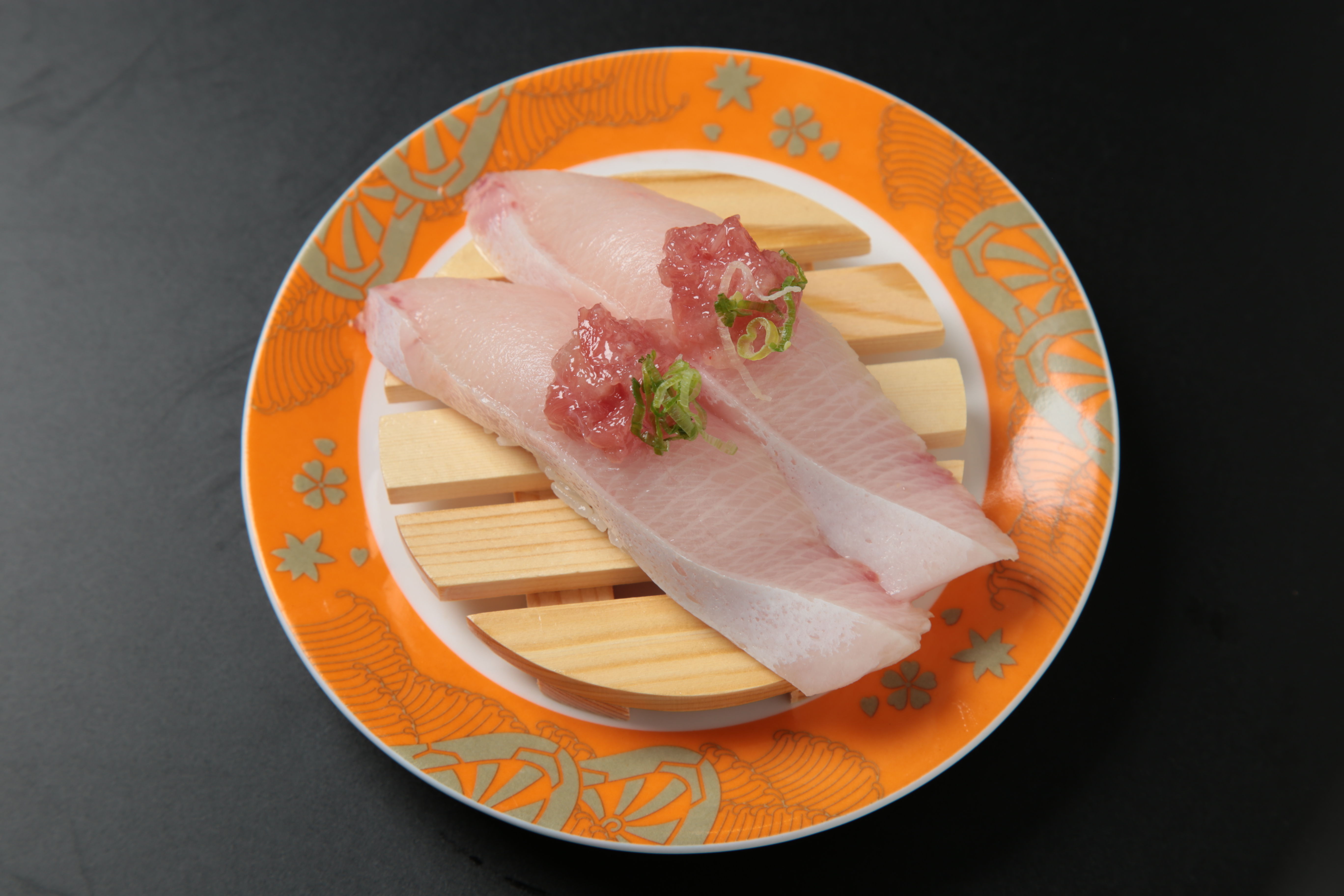 Order Hamachi Belly Nigiri food online from Izumi Revolving Sushi store, Daly City on bringmethat.com