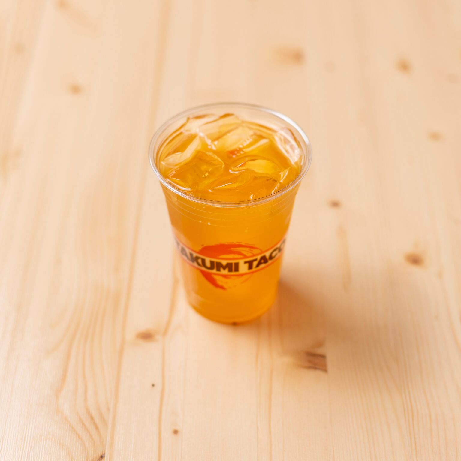 Order Peach Iced Tea (Sweetened) food online from Takumi Taco store, New York on bringmethat.com
