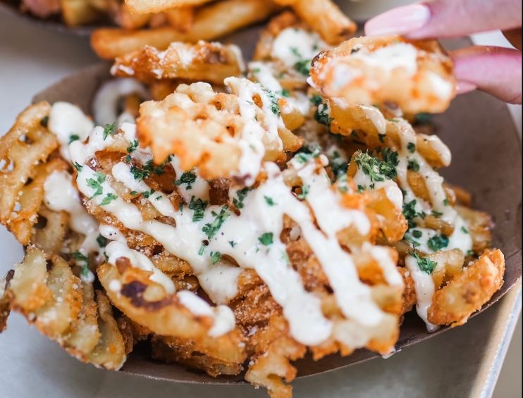 Order Trufflin Waffle Fries food online from Hangry Belly store, Long Beach on bringmethat.com