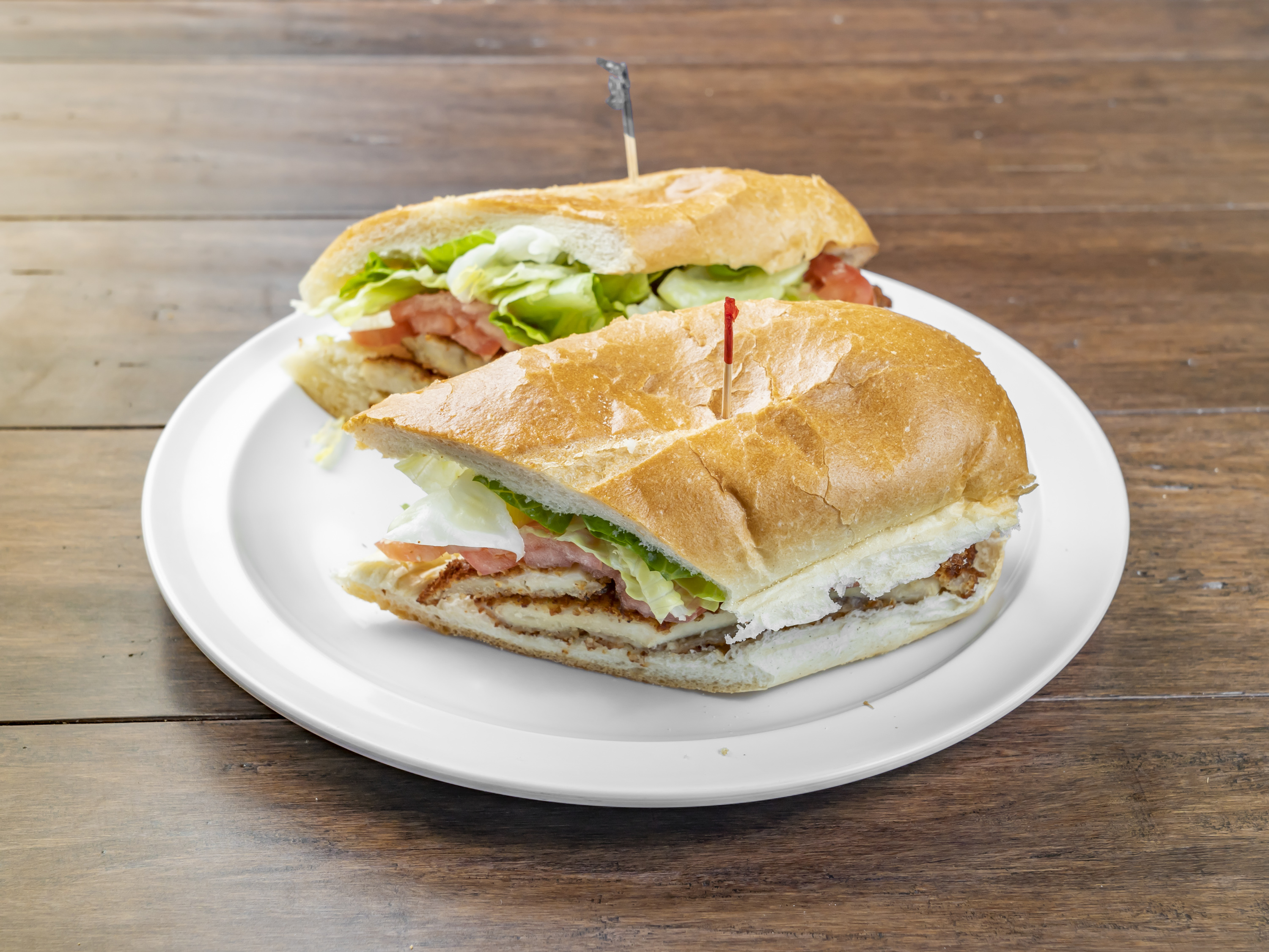 Order Chicken Cutlet with Lettuce and Tomatoes Wedge food online from Westover Pizza store, Stamford on bringmethat.com