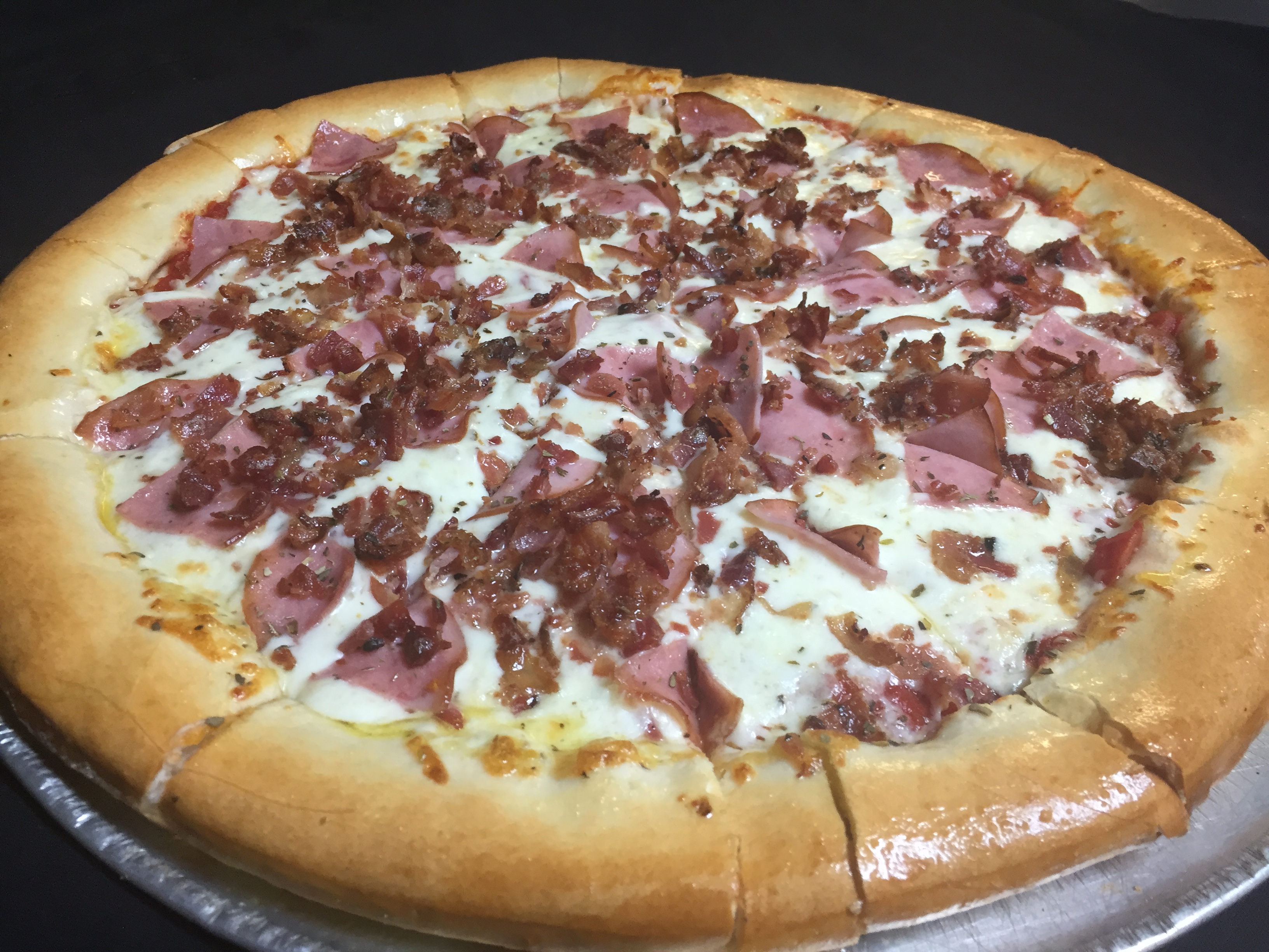 Order 19" Big Boss Pizza with 2 to 4 Toppings food online from Bosses Brickoven Pizza store, Lake Worth on bringmethat.com