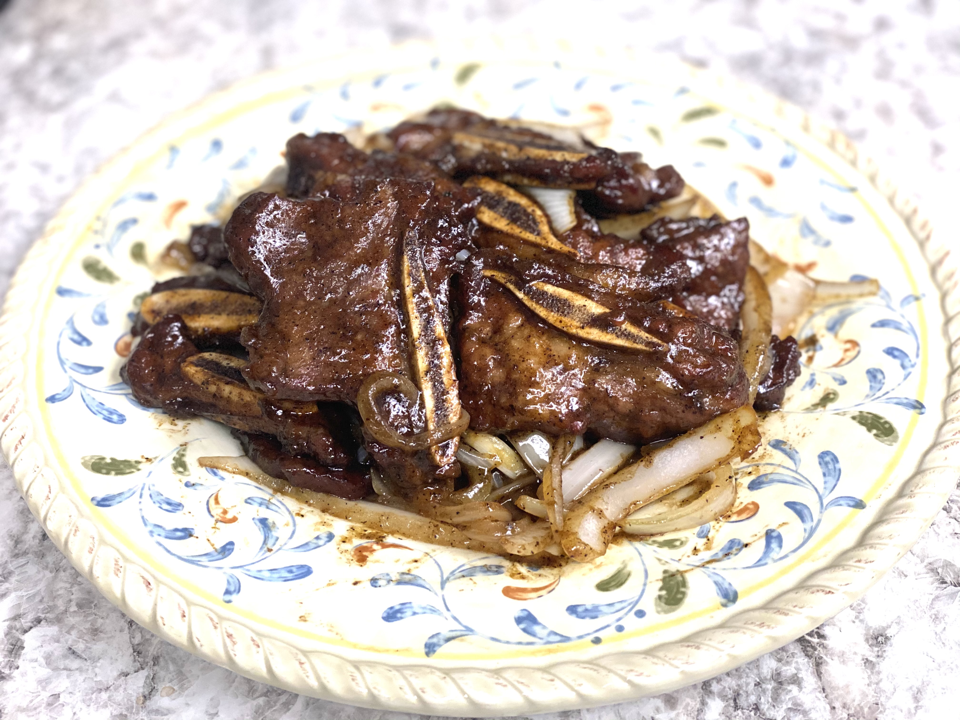 Order F22. Black Pepper Beef Short Ribs 黑椒牛小排 food online from Uncle Chen Primetime store, State College on bringmethat.com