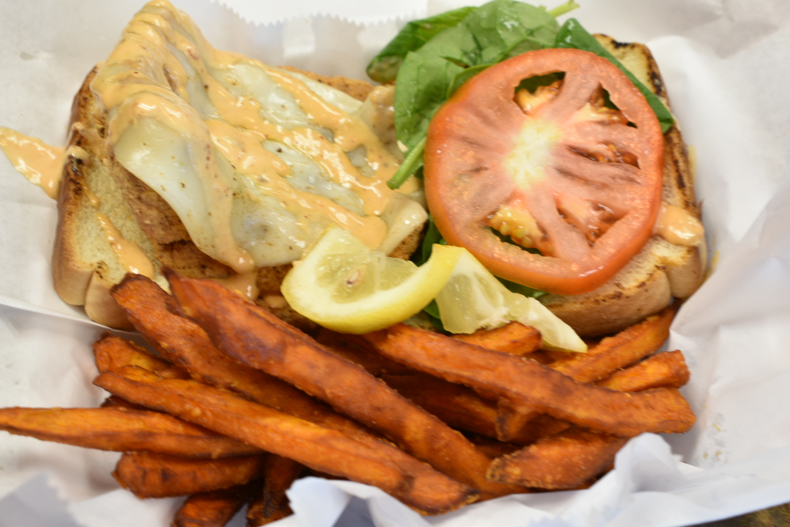 Order Grilled or Deep Fried Salmon Sandwich food online from Trap Fusion store, Memphis on bringmethat.com