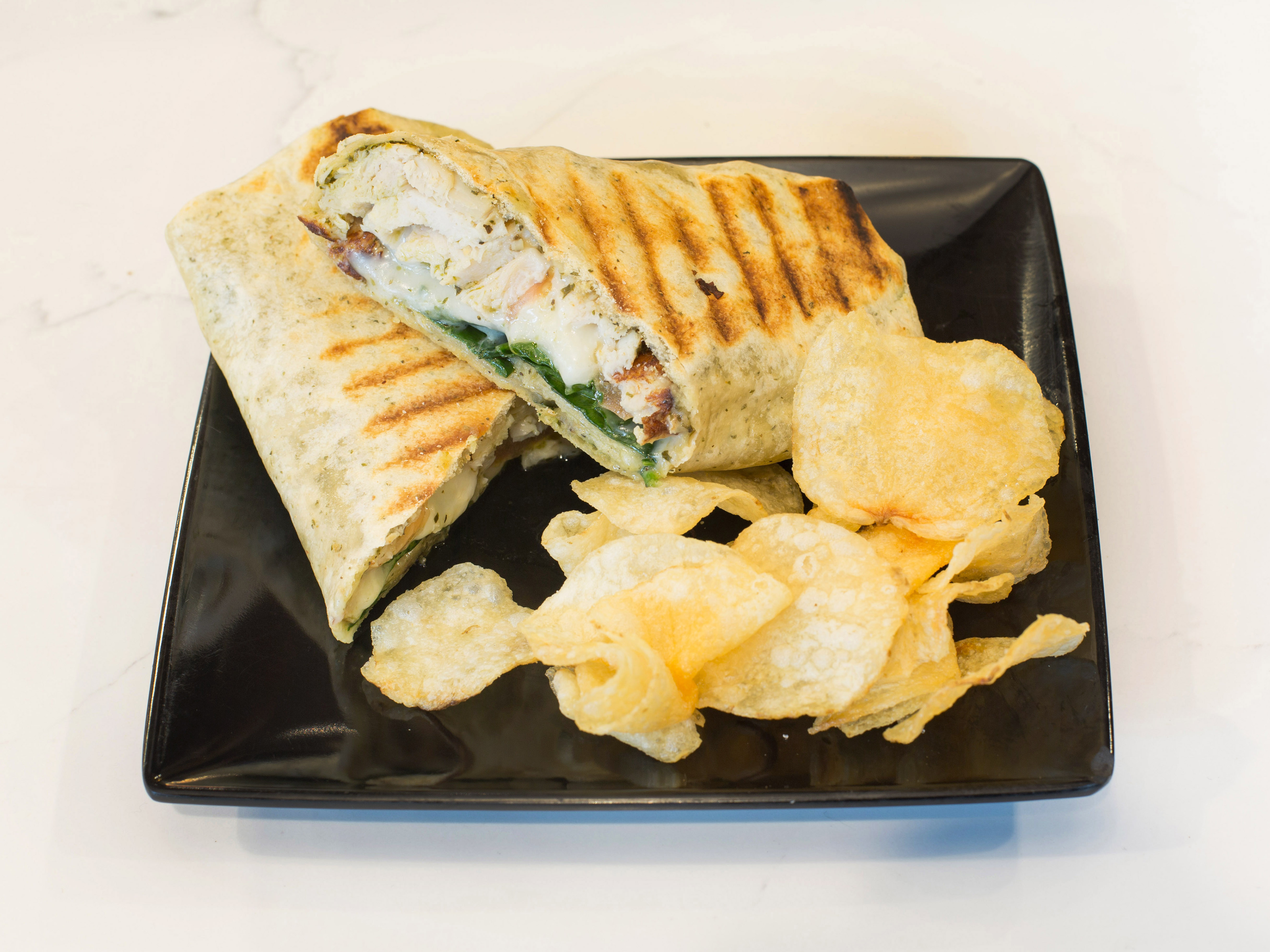 Order Chicken Pesto Wrap food online from Gloria Jean's Coffee Bean store, Youngstown on bringmethat.com