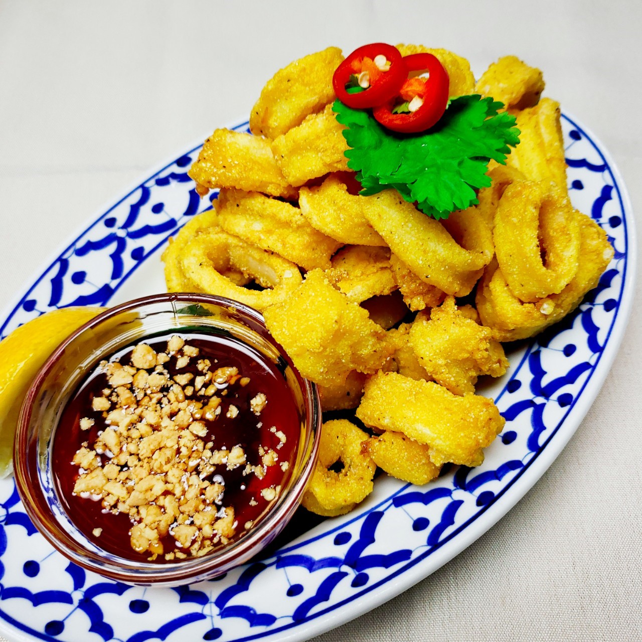 Order Pla Muk Tod food online from Thai Villa store, New York on bringmethat.com