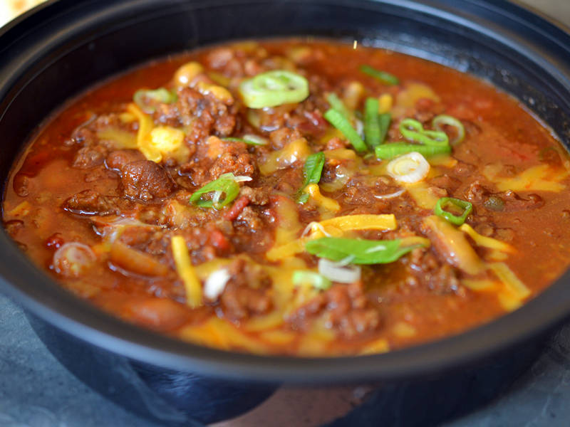 Order Chili Con Carne with Rice food online from Texas rotisserie store, New York on bringmethat.com