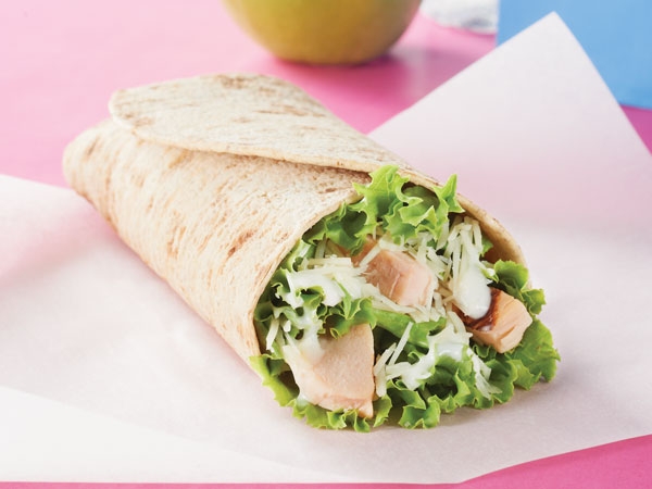 Order Grilled Chicken Caesar Wrap food online from Mrs. P and Me store, Mount Prospect on bringmethat.com