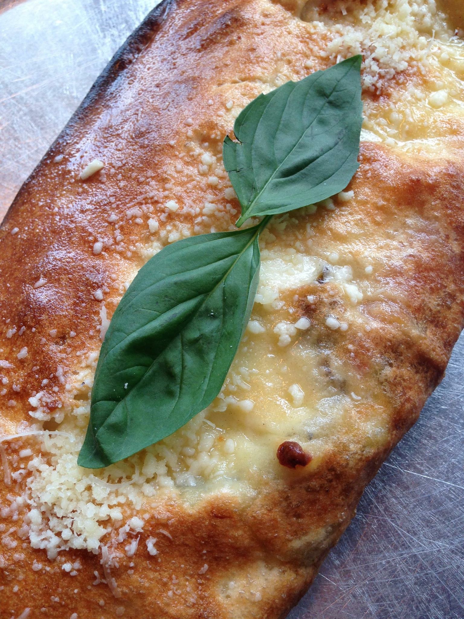 Order Americano Calzone food online from SLiCE store, Sewell on bringmethat.com