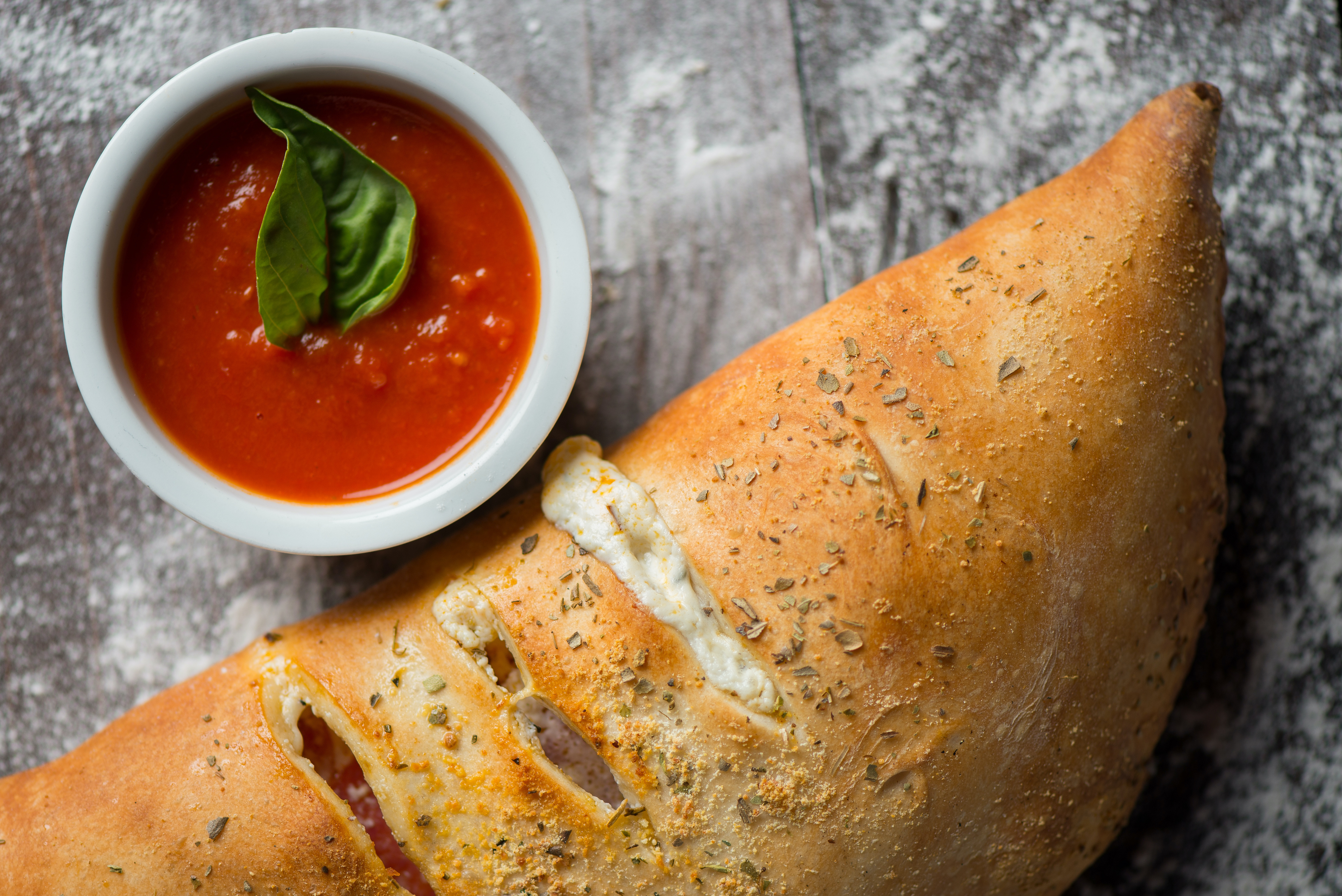 Order Calzone food online from Primo Pizzeria store, Ballston Spa on bringmethat.com