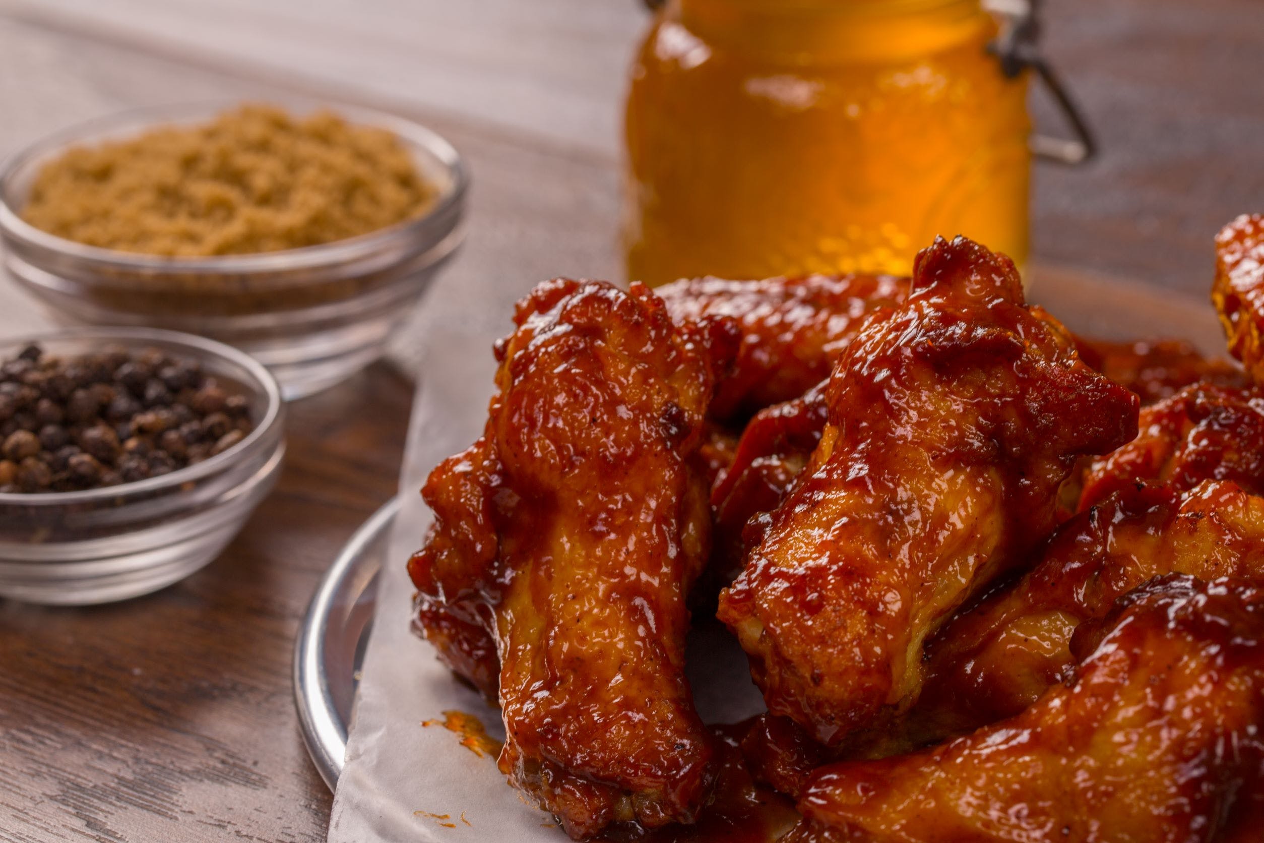 Order Stingin Honey Garlic Wings - 6 Pieces food online from Mountain Mikes Pizza store, Woodland on bringmethat.com