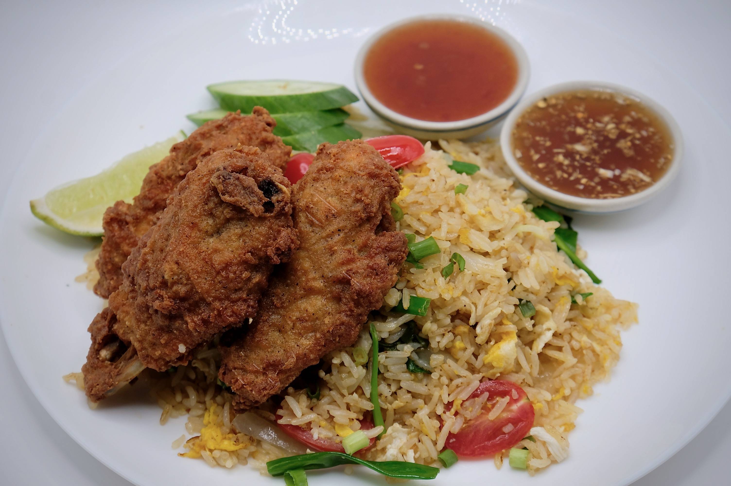 Order Thai Fried Rice with special sauce of Chicken wings / Tender chicken food online from Pro thai store, New York on bringmethat.com