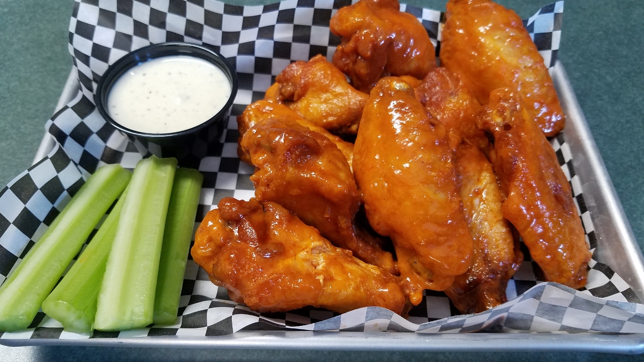 Order *(10) Wings food online from The Distillery Restaurant store, Victor on bringmethat.com
