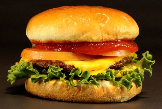 Order Solo JR Deluxe Cheese Burger food online from Solo Burgers&Wings store, Dallas on bringmethat.com