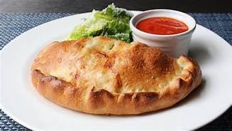 Order Calzone - Small food online from Pino Ii Pizzeria & Restaurant store, Nazareth on bringmethat.com