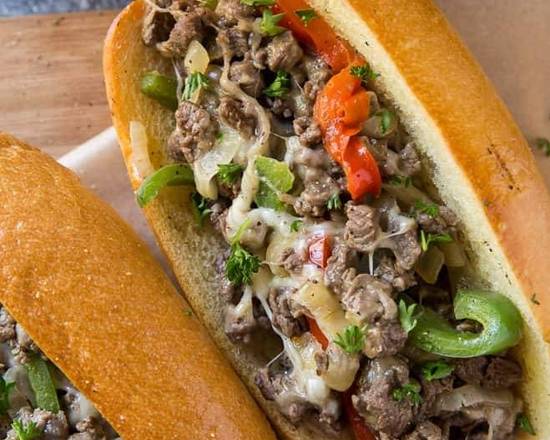 Order Halal Philly Cheesesteak with chips and drink food online from Taste of Egypt store, Arlington on bringmethat.com