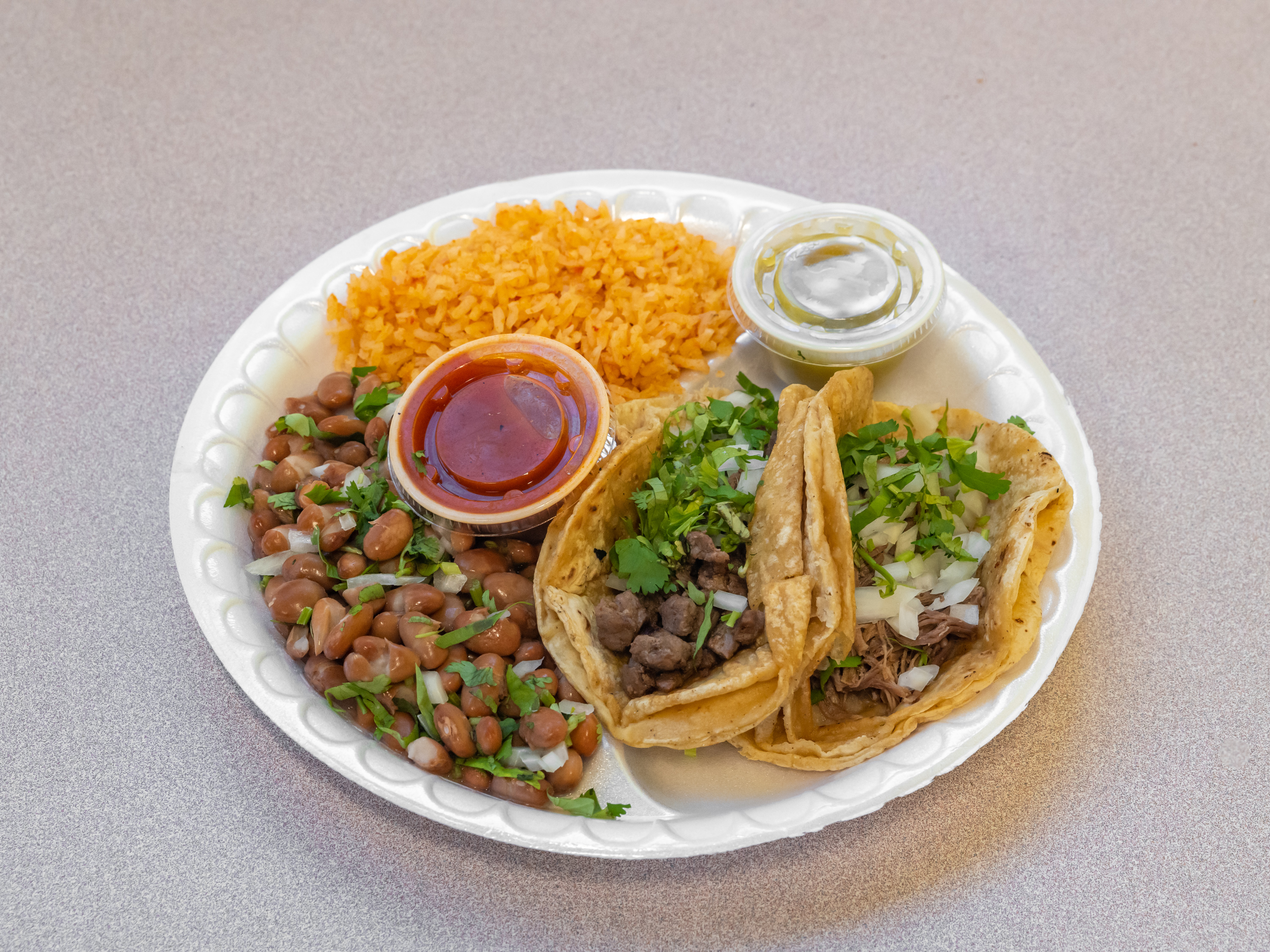 Order 2 Taco Daily Special food online from Taco King - W Liberty St. store, Ann Arbor on bringmethat.com