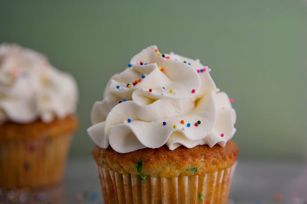 Order Confetti Cupcakes food online from Destination Desserts store, St. Louis on bringmethat.com