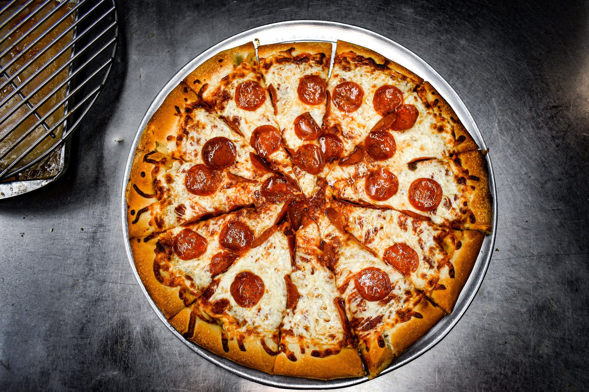 Order Pepperoni Pizza Slice - Slice food online from BJ's Pizzeria store, Montebello on bringmethat.com