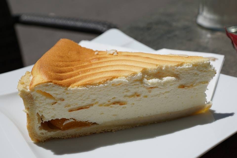Order Plain Cheesecake - Slice food online from Omg Pizza store, Hawthorne on bringmethat.com