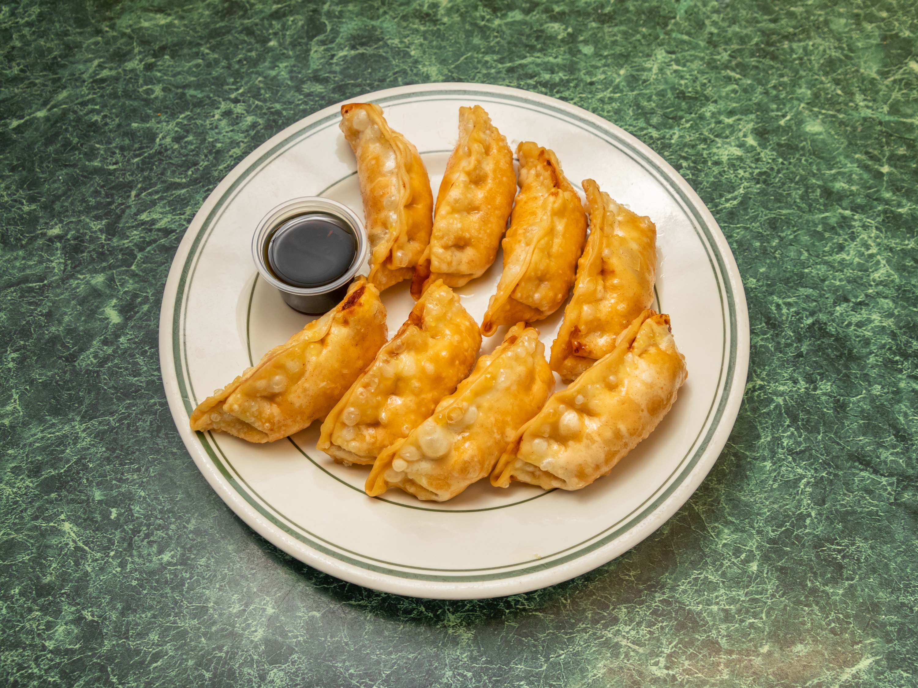 Order A4. Pot-Stickers Chicken food online from Dragon Palace store, Norcross on bringmethat.com
