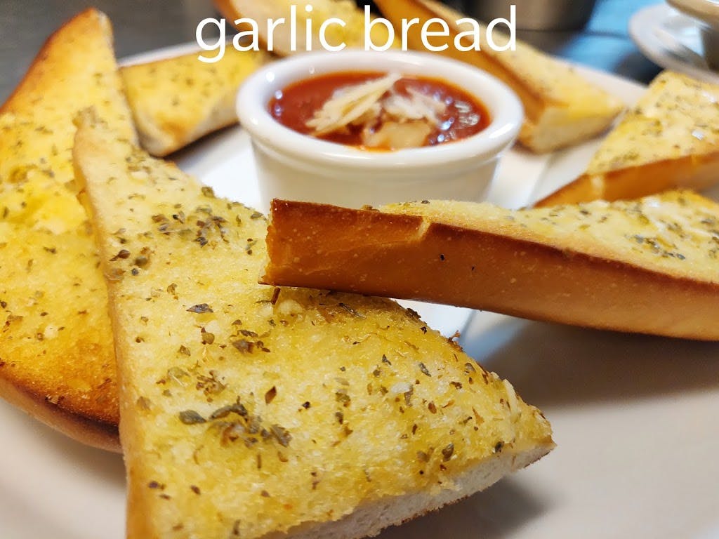 Order Garlic Bread - Appetizer food online from Soprano's Antico store, Seattle on bringmethat.com