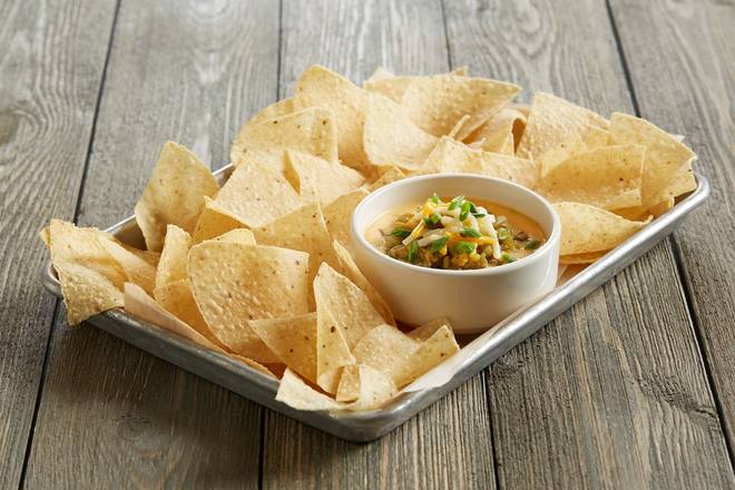 Order Sriracha Queso Dip With Seared Hatch Chiles food online from Bj Restaurant & Brewhouse store, Merrillville on bringmethat.com