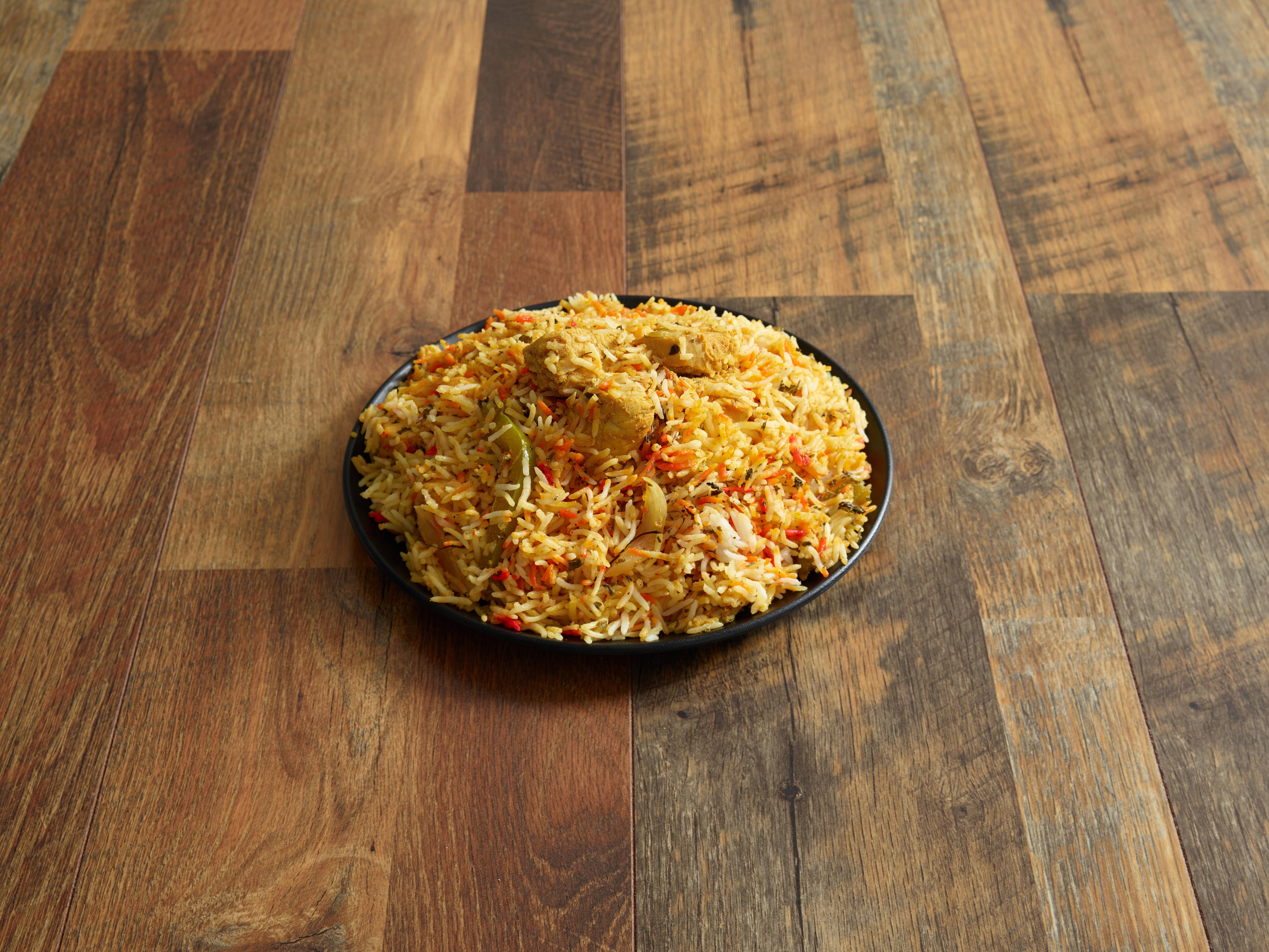 Order 76. Chicken Biryani food online from Royal Indian Grill store, Syracuse on bringmethat.com