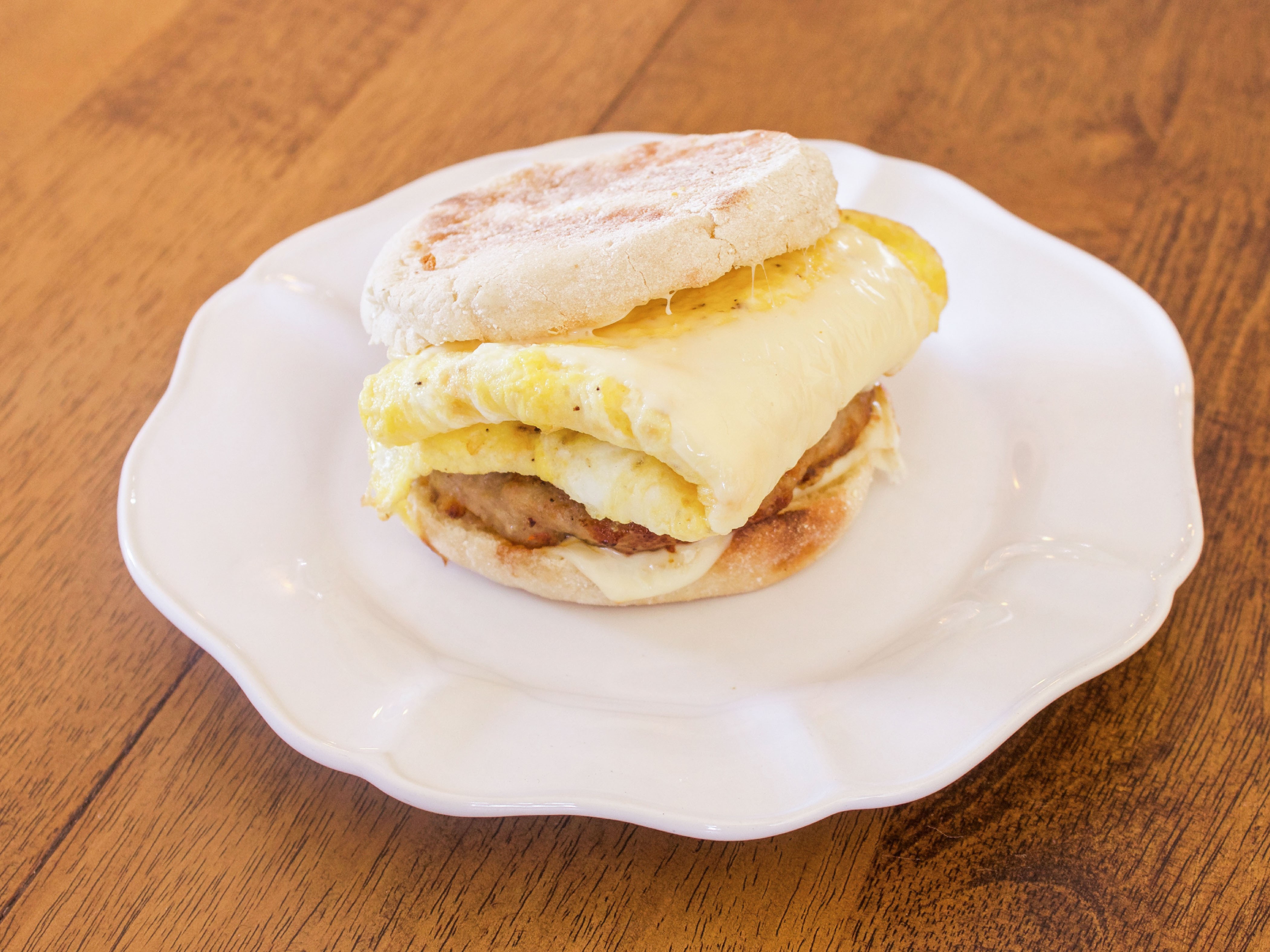 Order Egg Sausage and Cheese Sandwich Breakfast food online from Kefa Coffee store, Oakland on bringmethat.com
