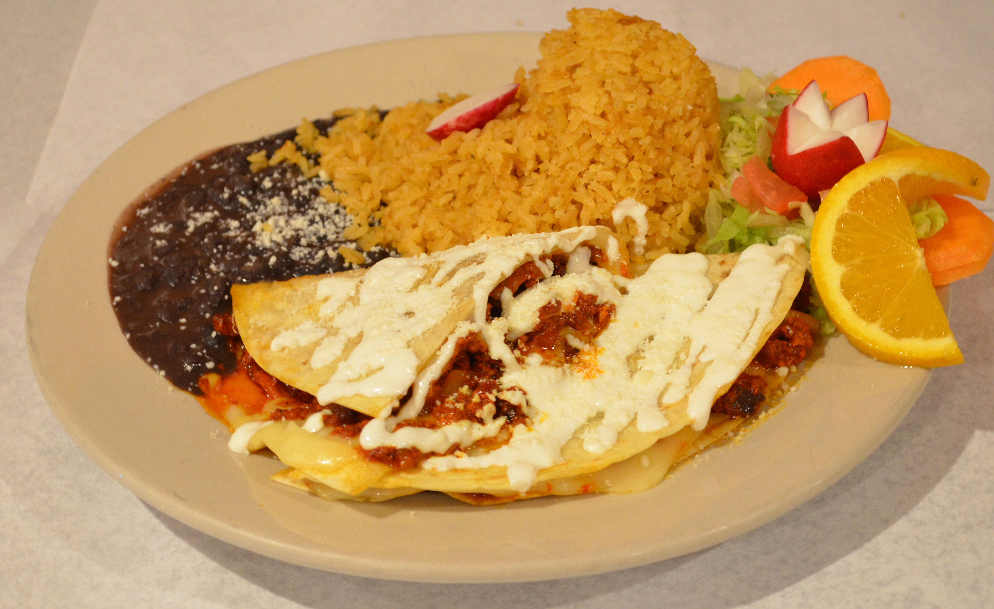 Order Sincronisada Quesadilla food online from Pancho Villa Restaurant store, Bronx on bringmethat.com