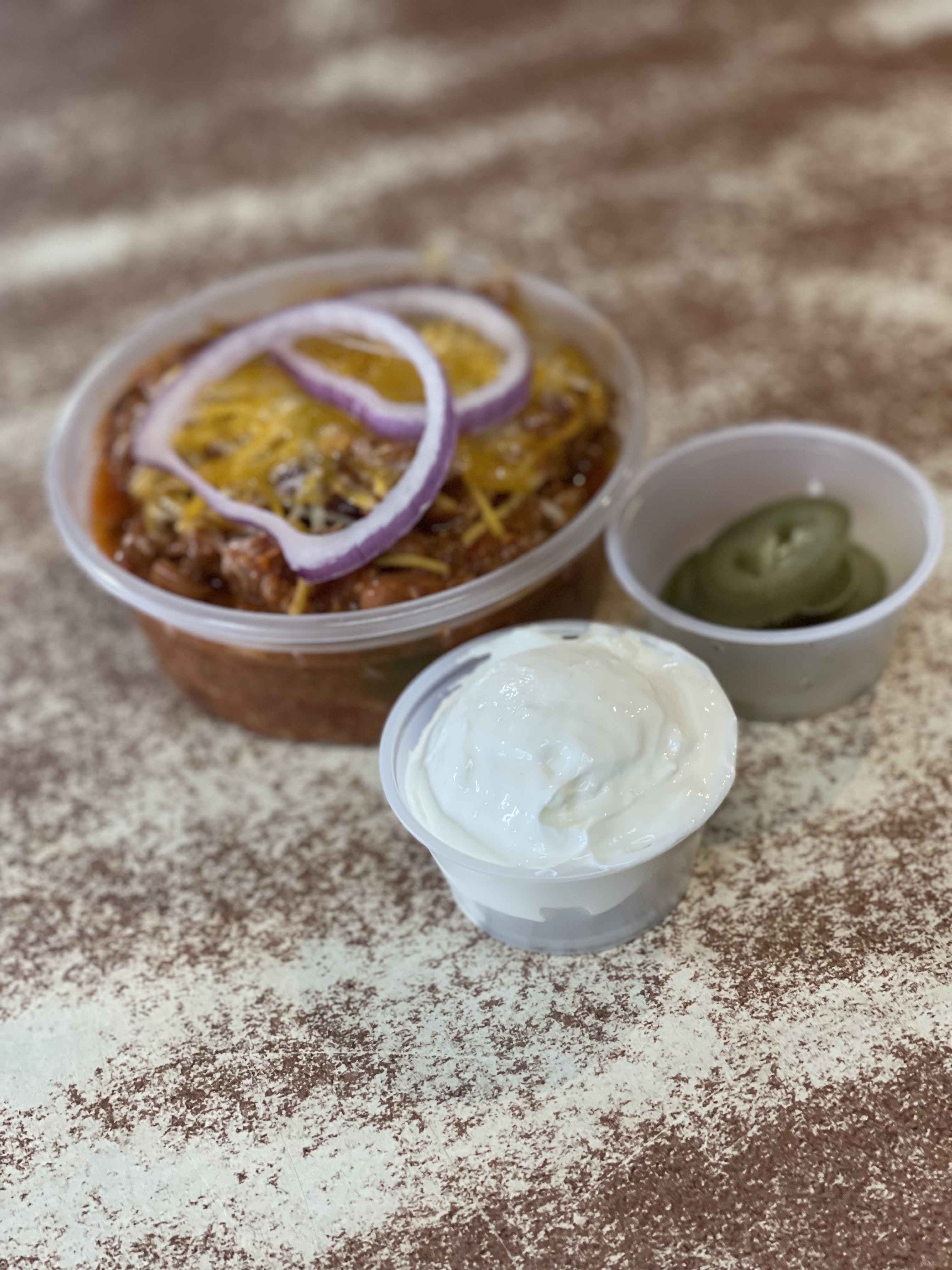 Order Cup of Brisket Chili food online from Outlaw Potato Shack by Texas BBQ Joint  store, Rochester on bringmethat.com