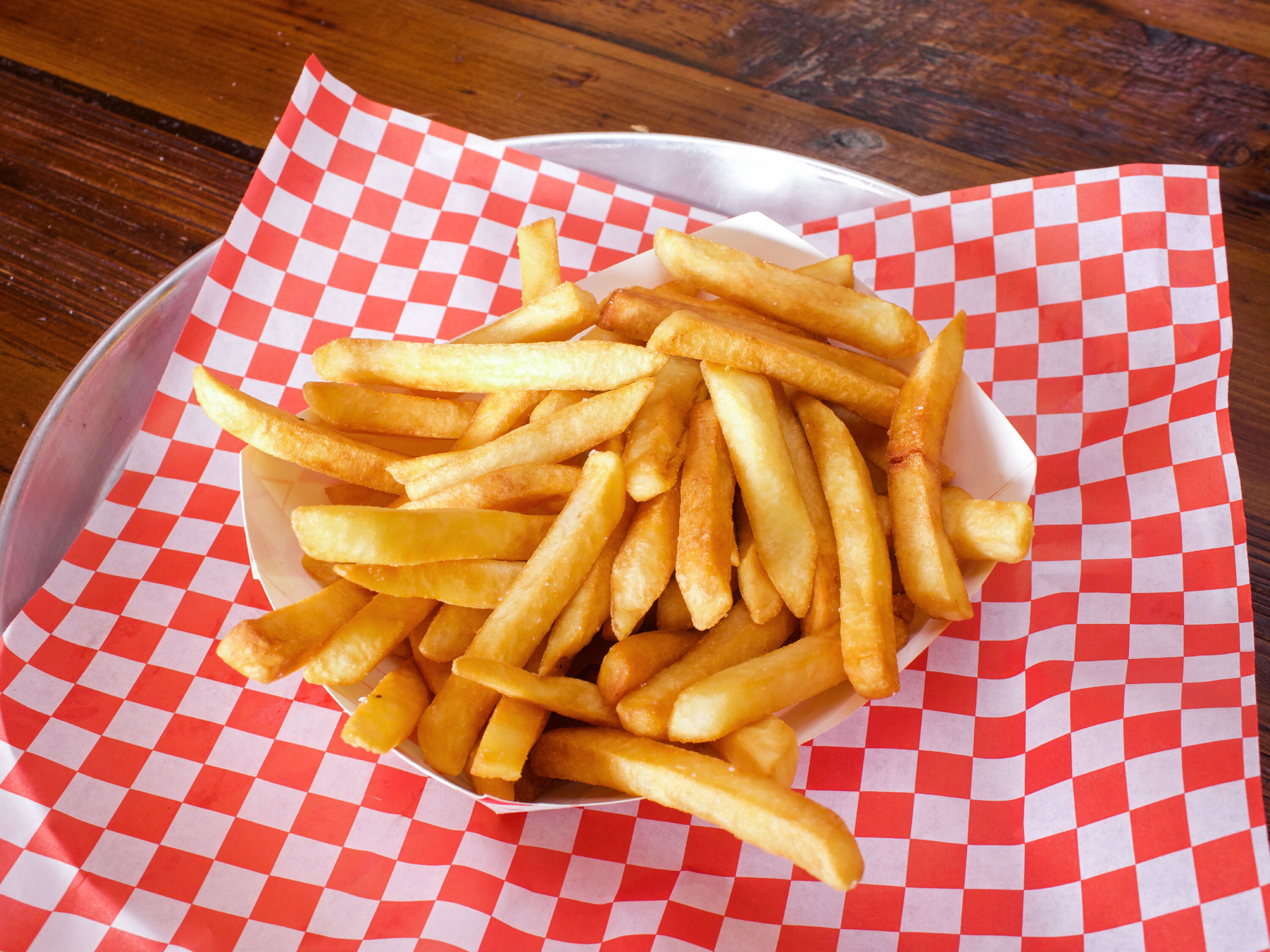 Order Basket of Fries food online from Saucy Wings store, San Francisco on bringmethat.com