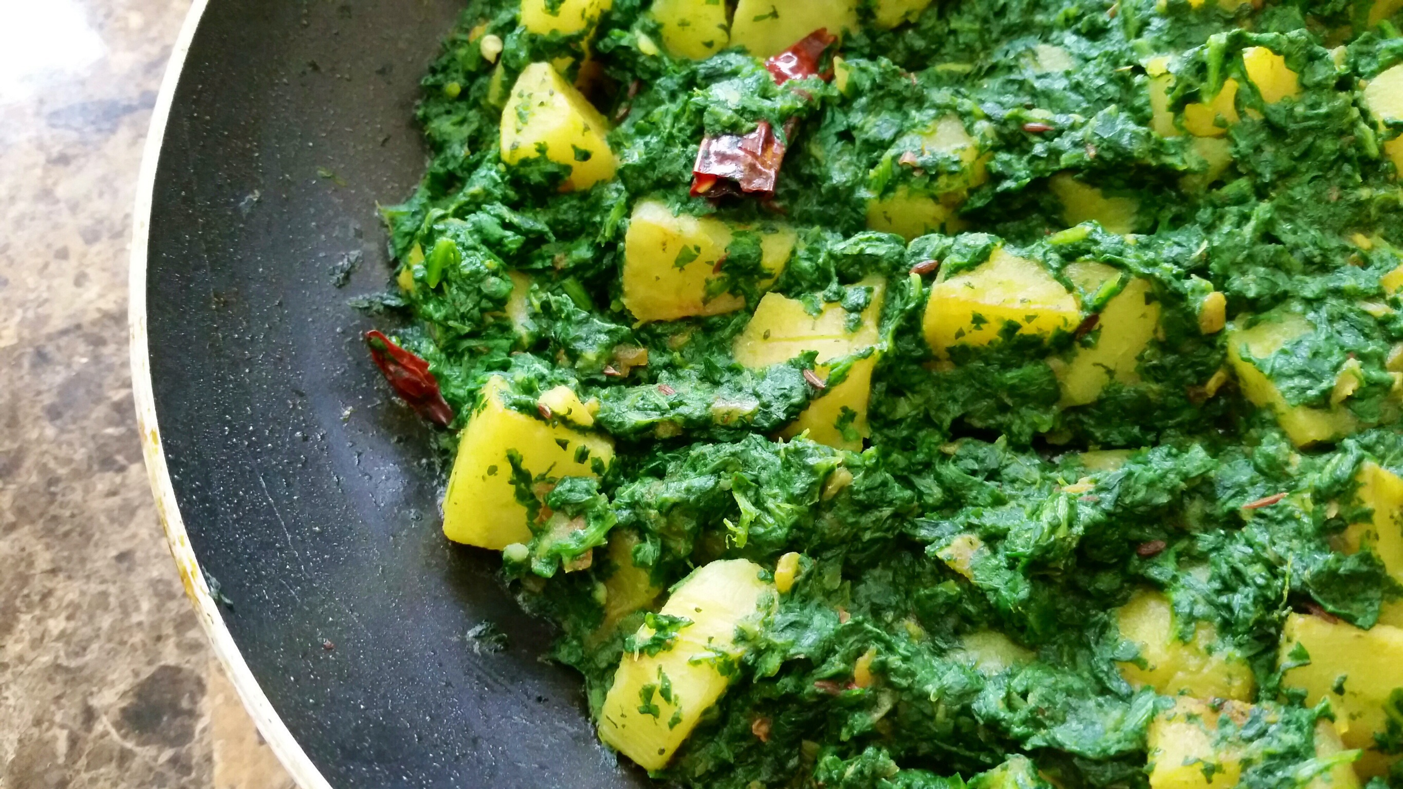 Order Palak Aloo food online from India's Grill store, Los Angeles on bringmethat.com