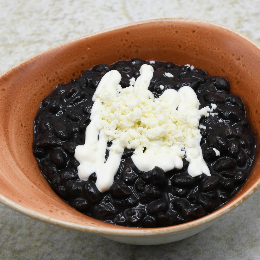 Order Refried Black Beans food online from Dos Caminos store, New York on bringmethat.com