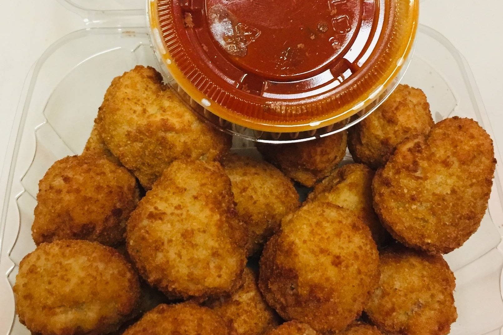 Order **Fried Mush( 9 Pcs ) food online from Pizza Queen store, Providence on bringmethat.com