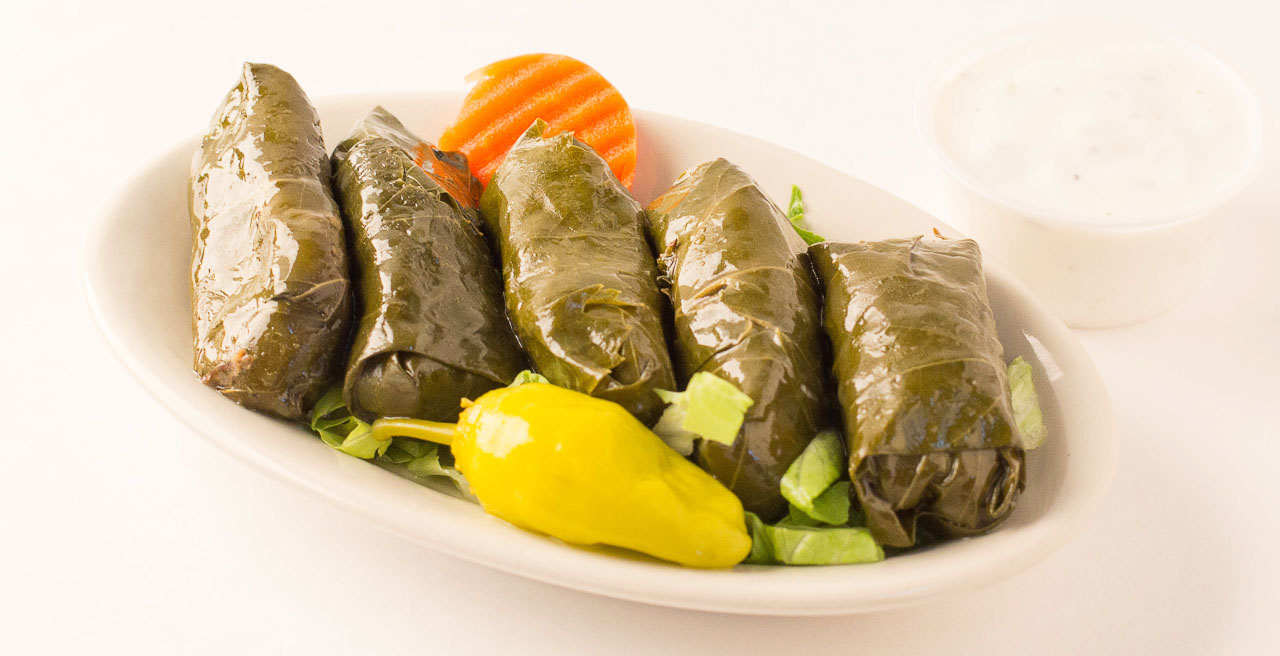 Order H24. 5 Piece Stuffed Grape Leaves food online from Zamani Mediterranean Grill store, Spring on bringmethat.com