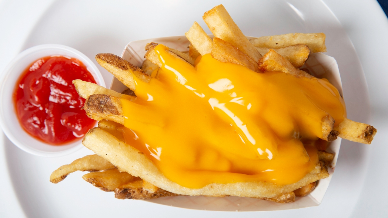 Order Homemade Cheese Fries food online from Out of the Park Burgers store, Central Islip on bringmethat.com