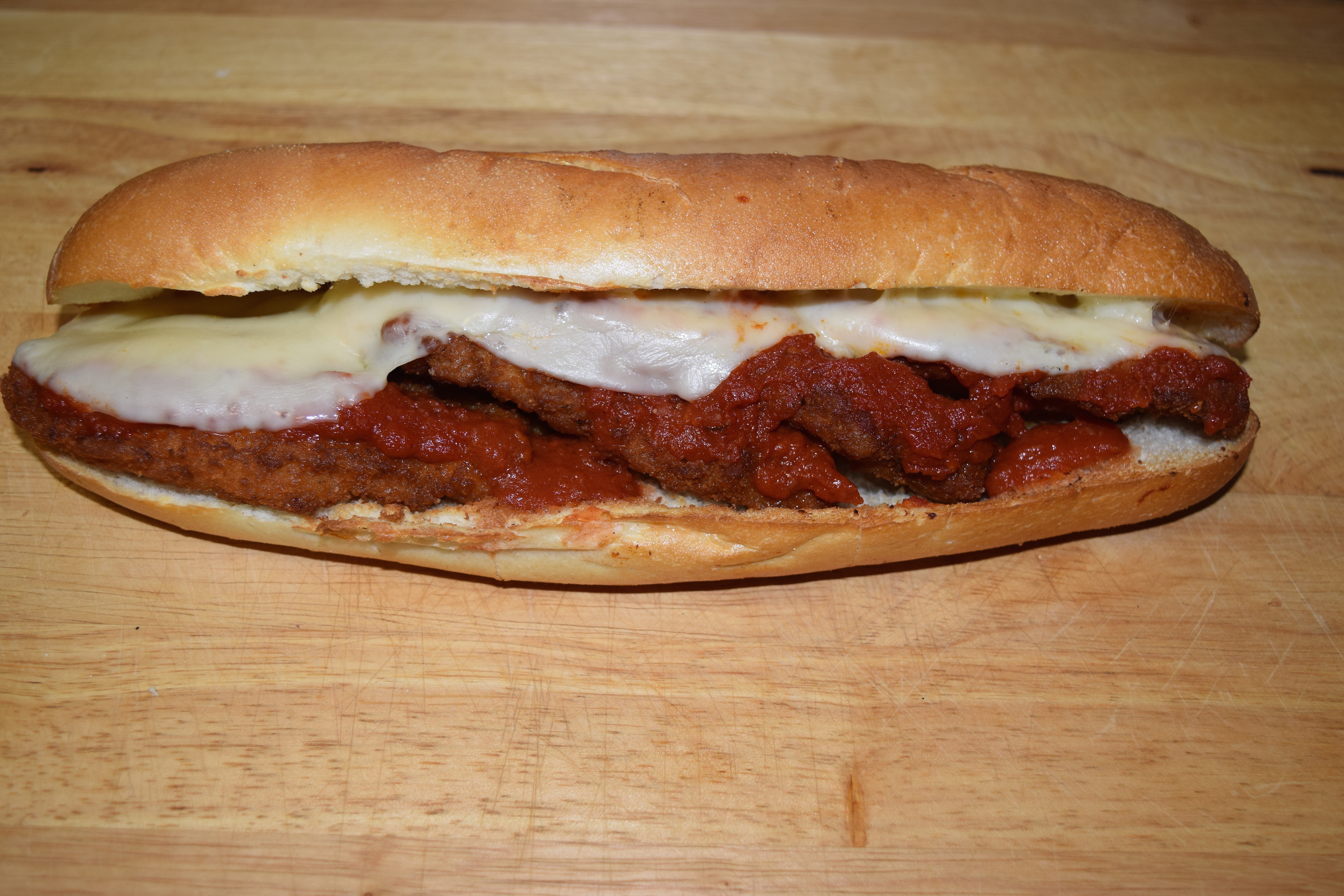 Order Chicken Parmigiana Sub food online from Cuzino Pizza & Pasta store, North East on bringmethat.com