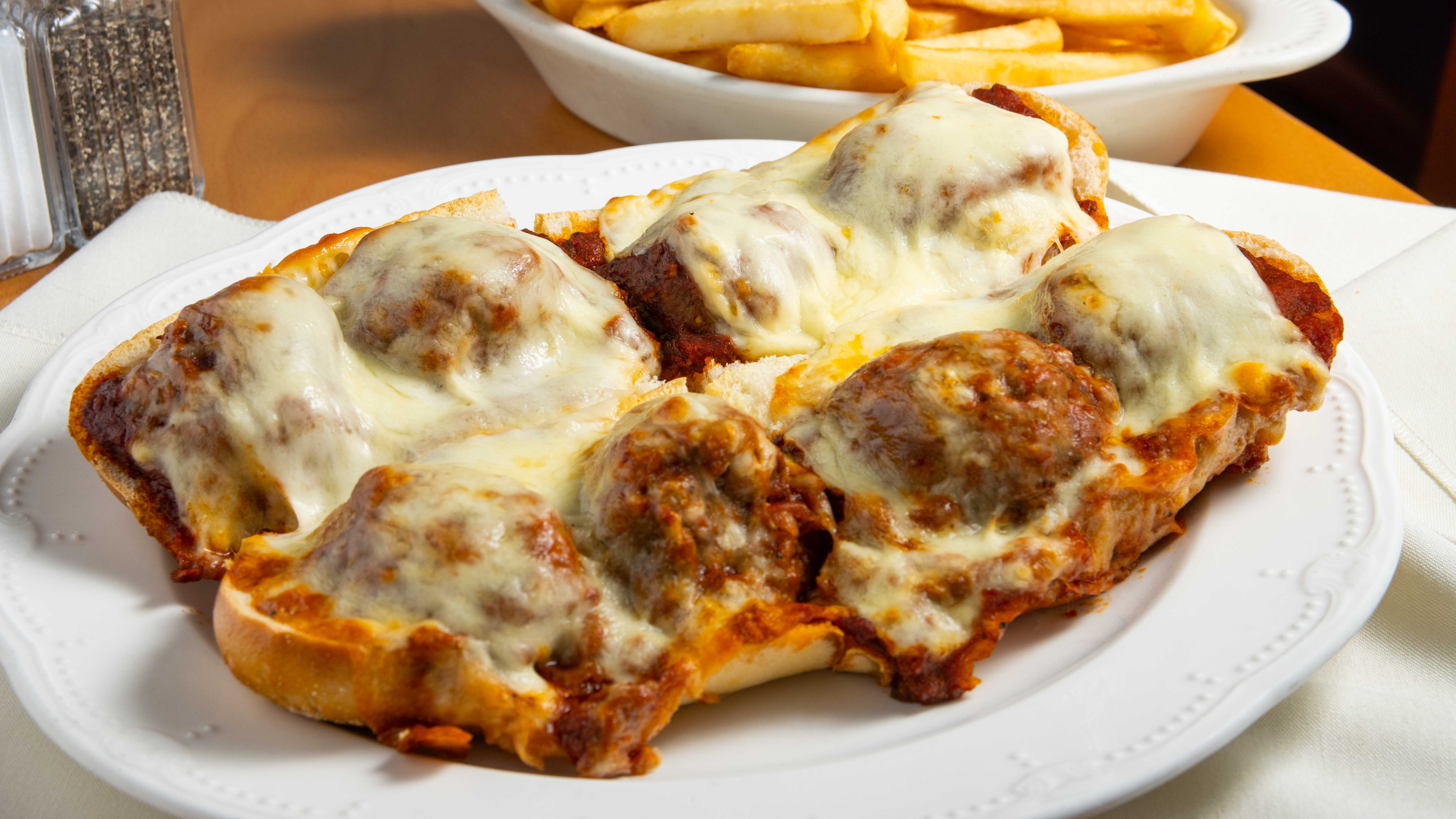 Order Meatball Parmigiana Sub - 10" food online from Lazio Pizza store, East Hanover on bringmethat.com