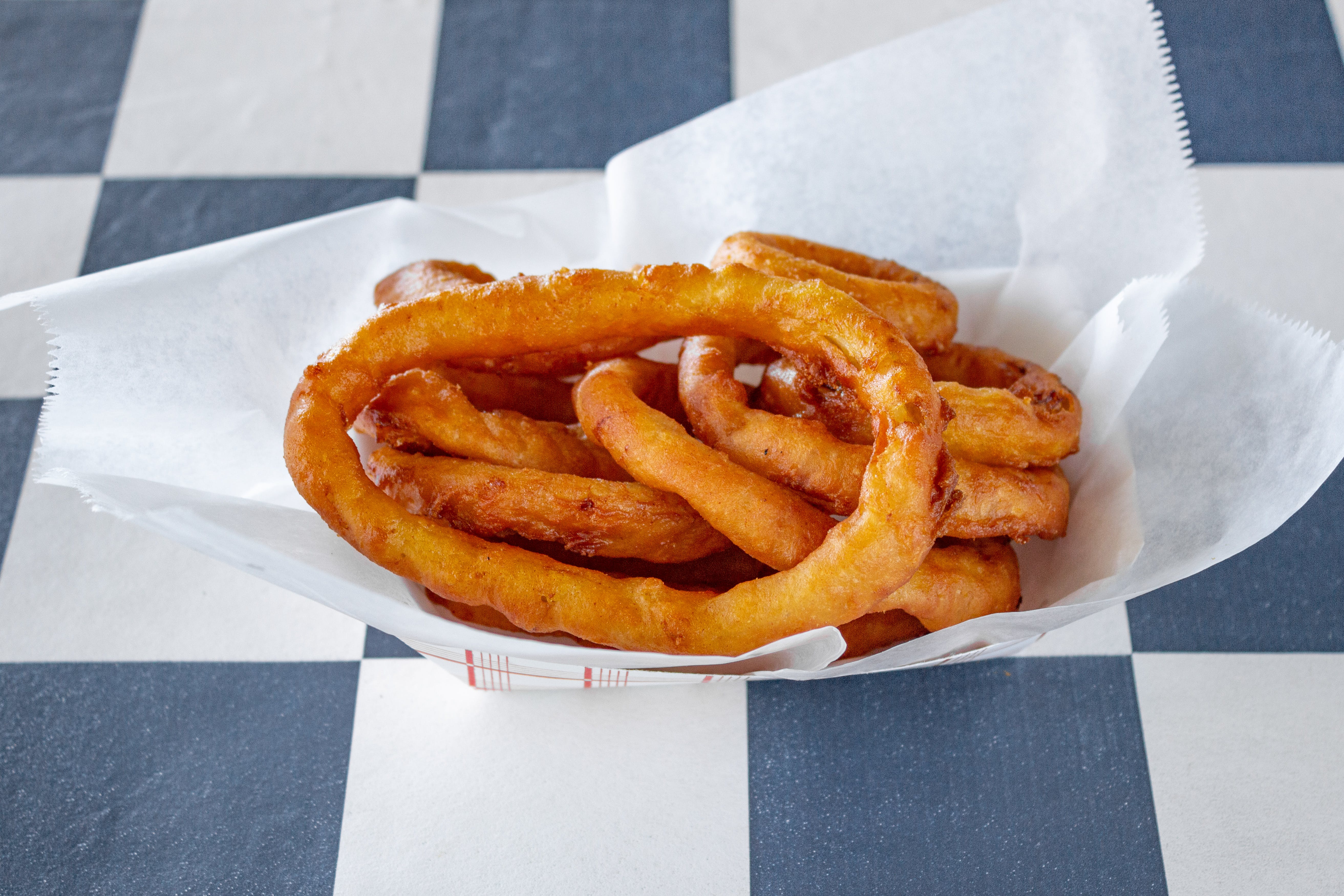 Order Onion Rings - Side food online from Besta Pizza store, Getzville on bringmethat.com
