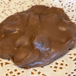 Order 1 Lb. Almond Cluster food online from Rocky Mountain Chocolate Factory store, Winston-Salem on bringmethat.com