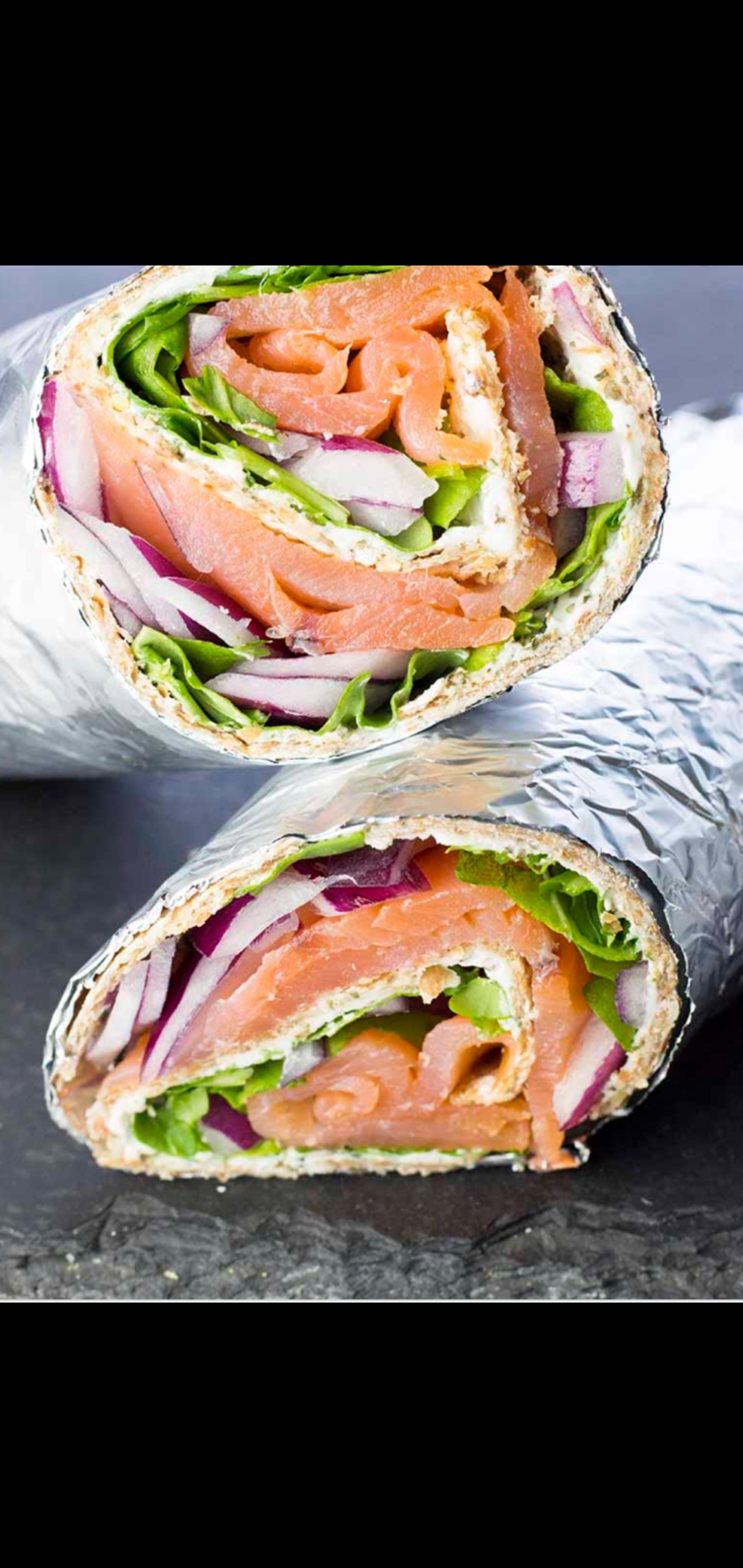 Order Healthy Breakfast Wrap (four egg whites nova smoked salmon fresh mozzarella spinach red onions & Avocado) food online from American Gourmet Foods Deli store, New York on bringmethat.com