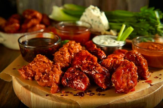Order Boneless Wings (10 pcs) food online from Duffy Sports Grill store, West Palm Beach on bringmethat.com