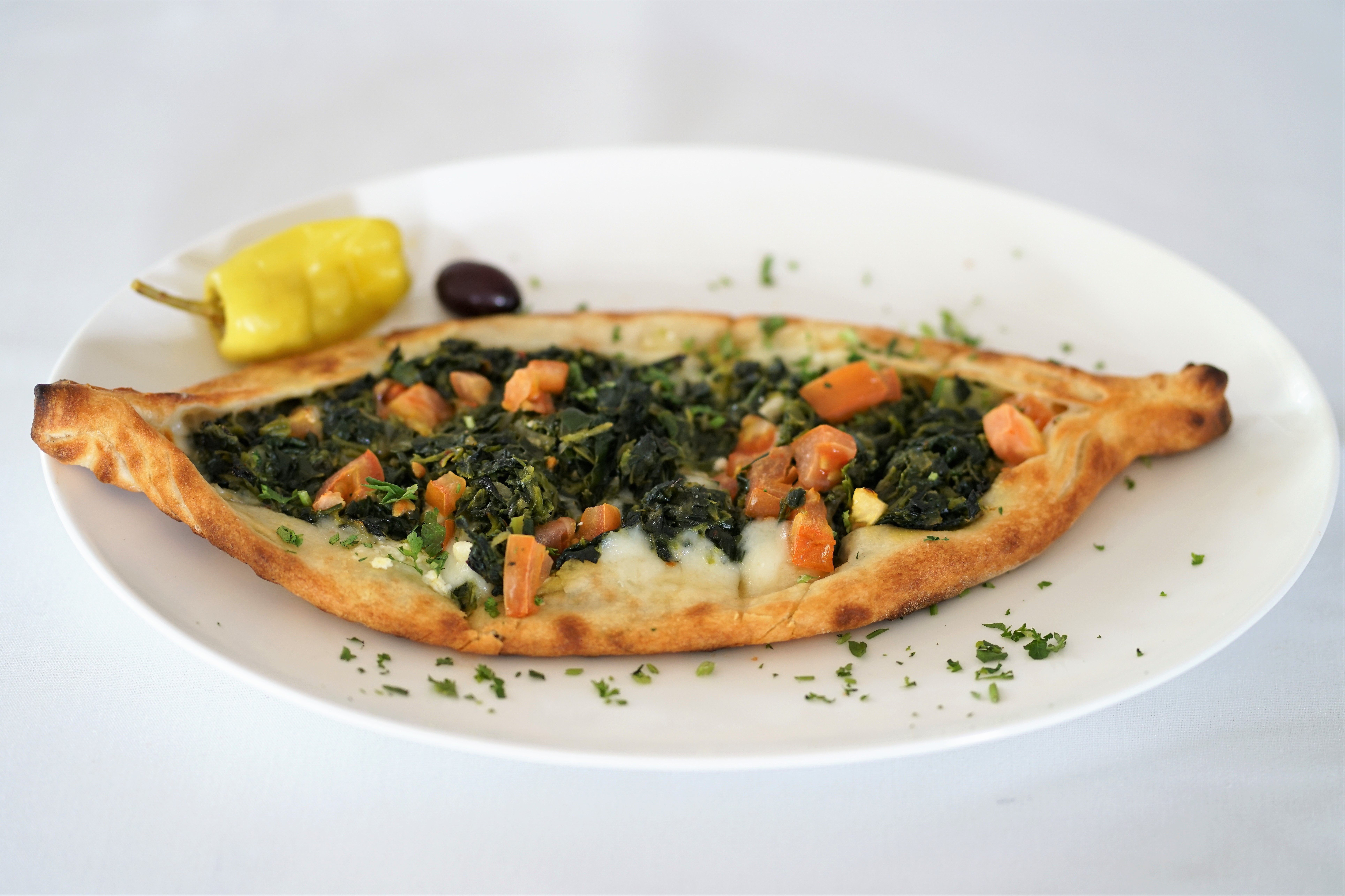 Order Spinach Pride Flatbread food online from Lezzet Restaurant store, Centreville on bringmethat.com