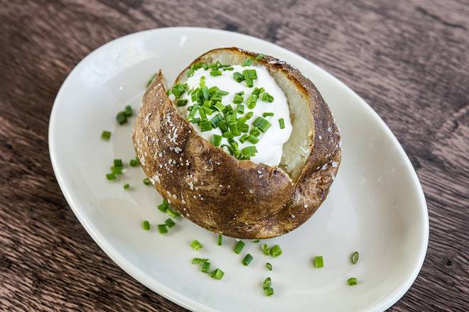 Order Idaho Baked Potato food online from Wood Ranch Bbq & Grill store, Anaheim Hills on bringmethat.com