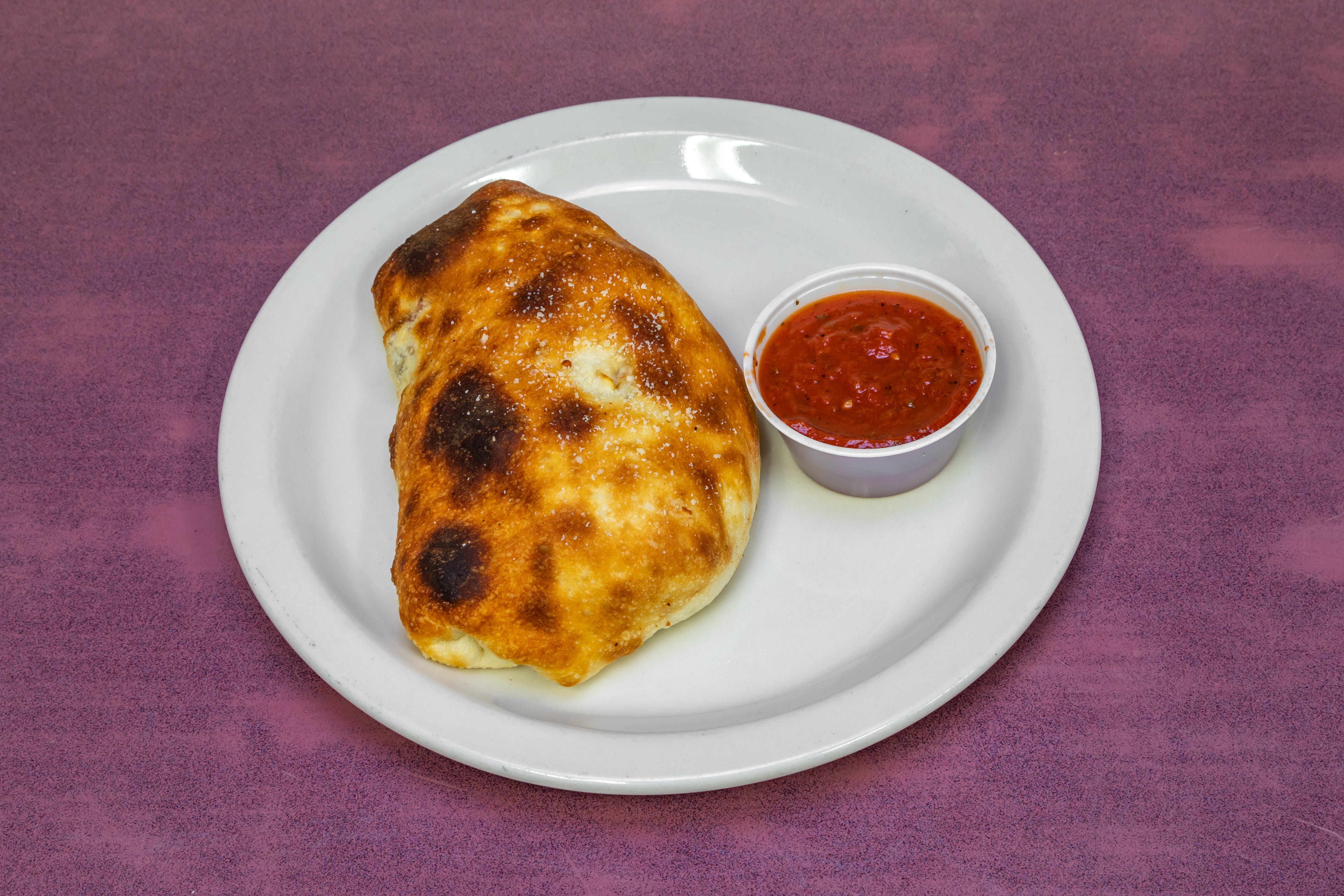 Order Classic Calzone - Calzone food online from Red Devil Italian Restaurant store, Tempe on bringmethat.com