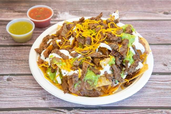 Order Nachos Supreme-1/2 food online from Sombrero Mexican Food store, San Diego on bringmethat.com