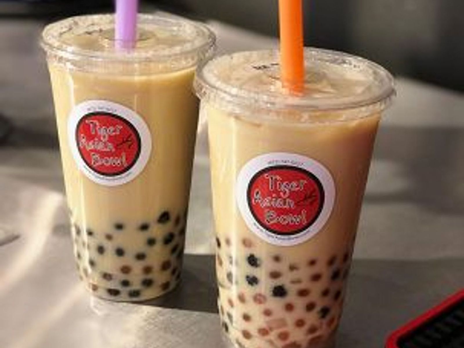 Order Milk Tea food online from Tiger Asian Bowl store, Allen on bringmethat.com