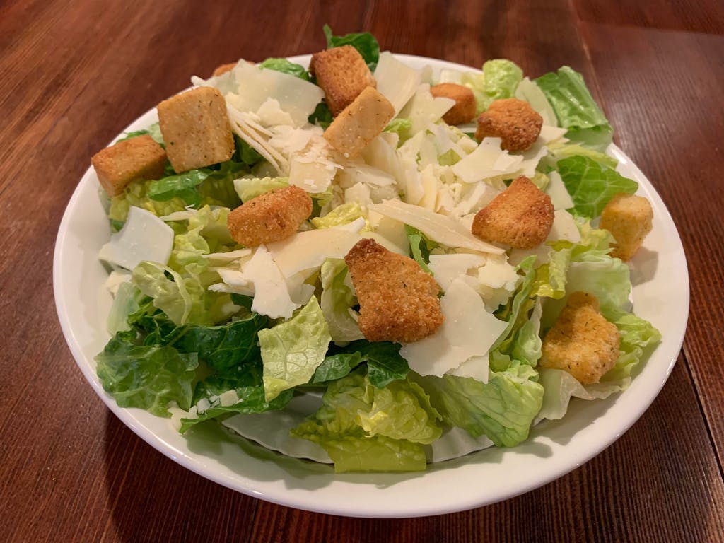 Order Caesar Salad - Salad food online from Cybelle's Pizza Restaurant store, Oakland on bringmethat.com