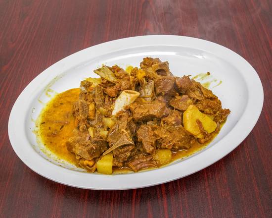Order Curry Goat food online from 2 Sisters 2 Sons store, Sharpsburg on bringmethat.com
